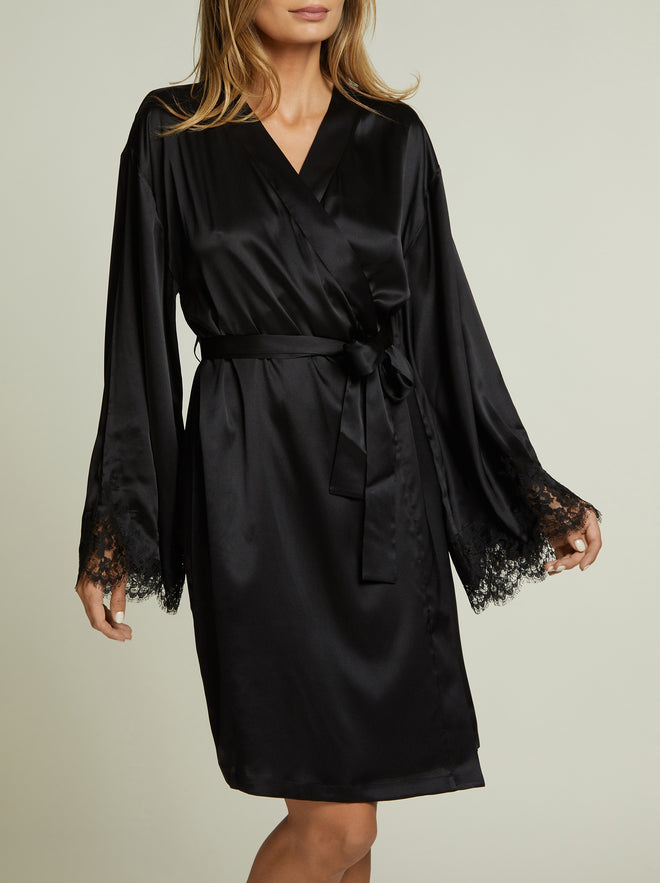 Hôtel Particulier Robe in Black front view showing wrap style with lace cuff detail