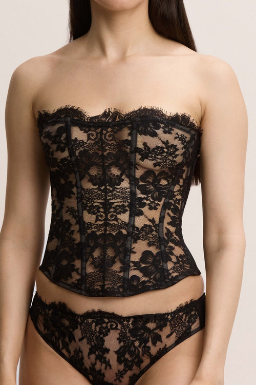 Tokyo Evenings Strapless Bustier in Black - I.D. Sarrieri
Black Chantilly lace corset crafted for a sculpted silhouette